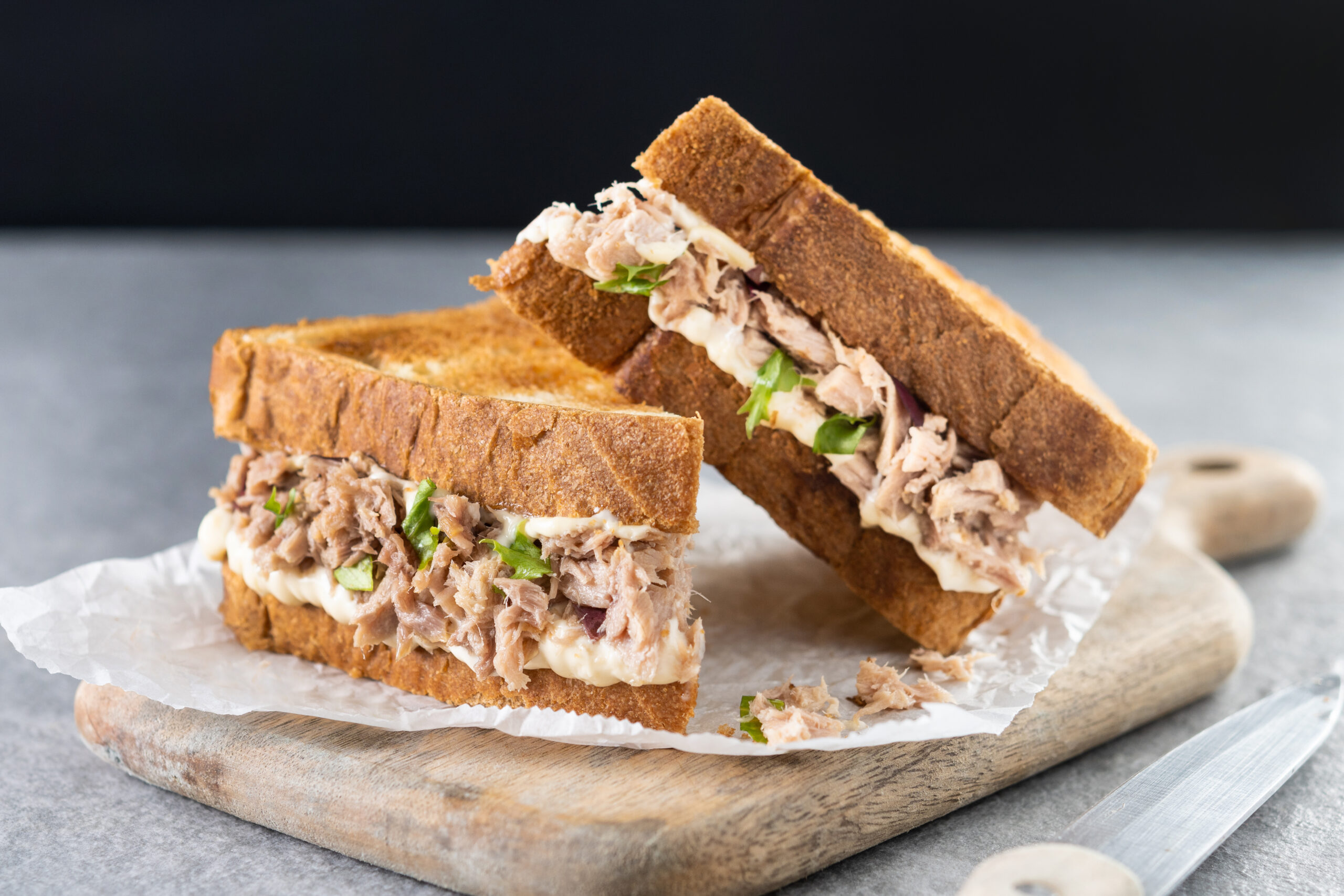 Tuna sandwich with dressing.